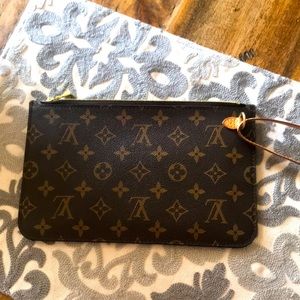 Brand new LV wristlet never used.
